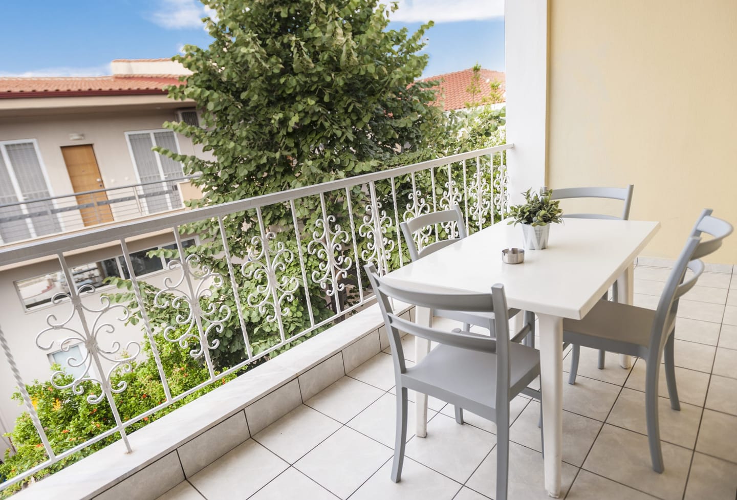 Balcony with chairs and street view