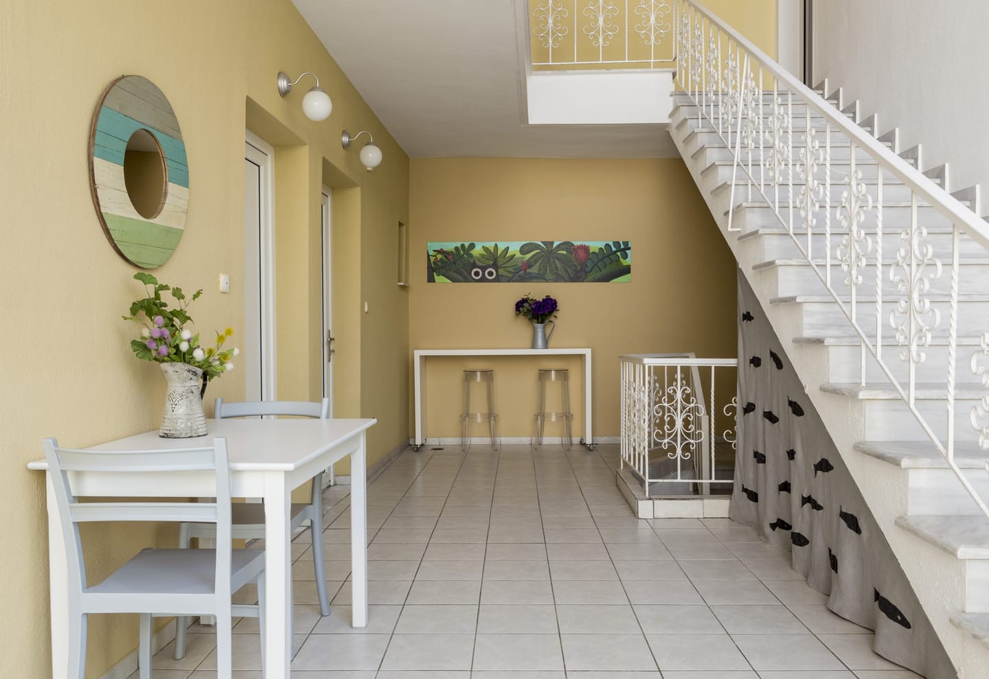 Entrance hall with table and staircase