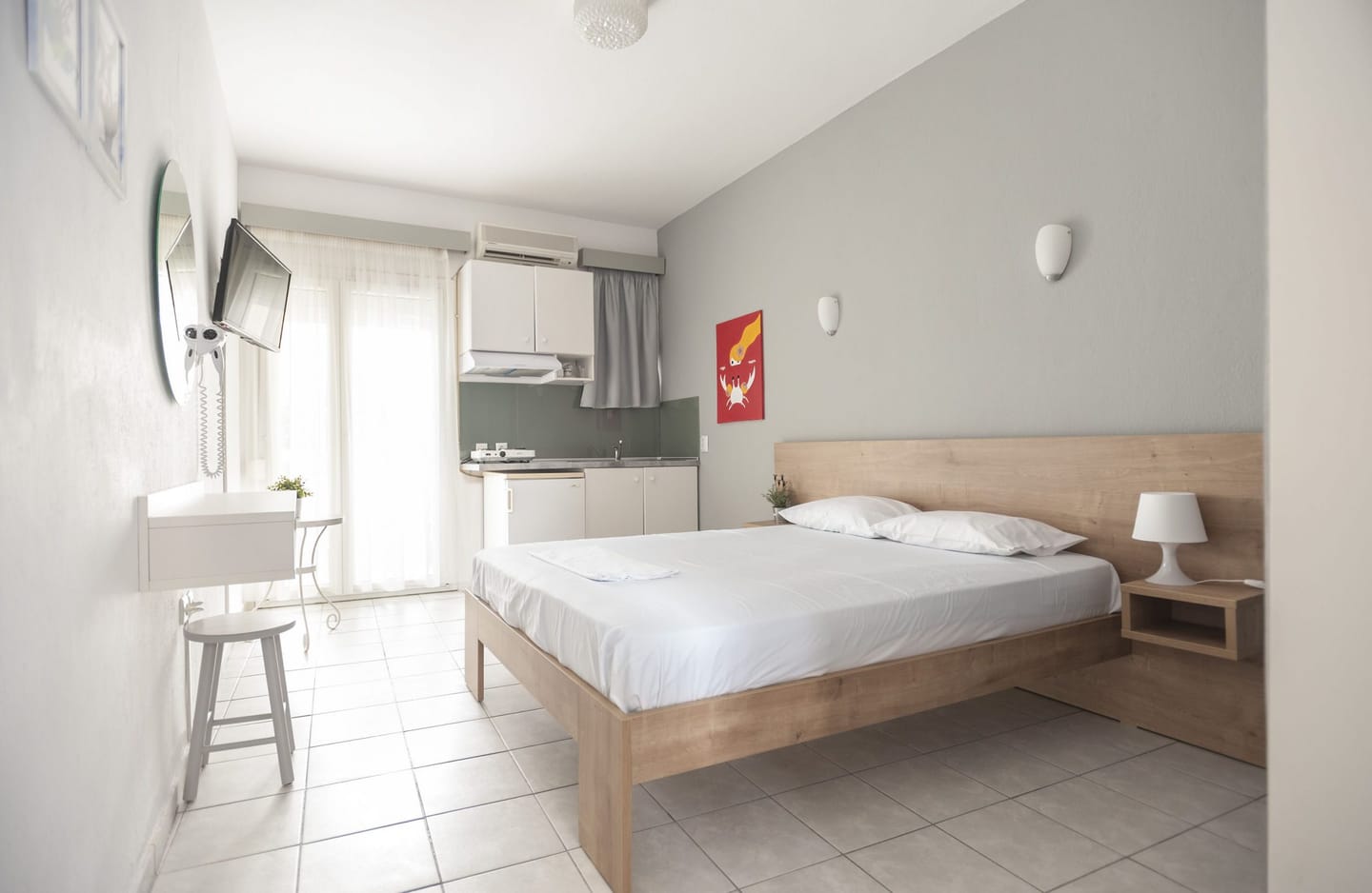 Studio 1: kitchenette and bed