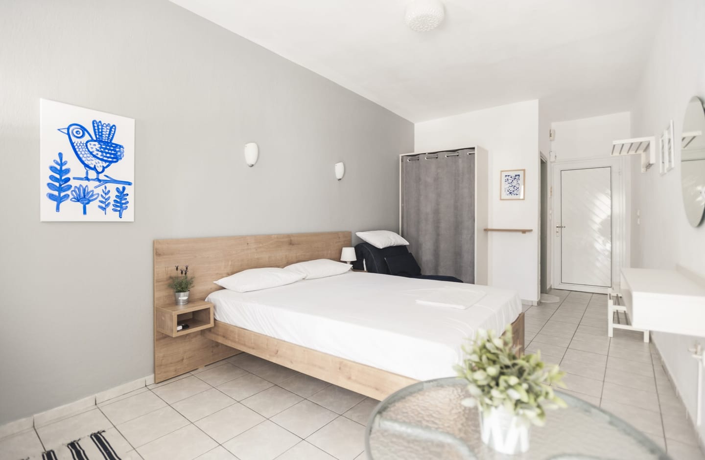 Studio with double bed and rabbit artwork